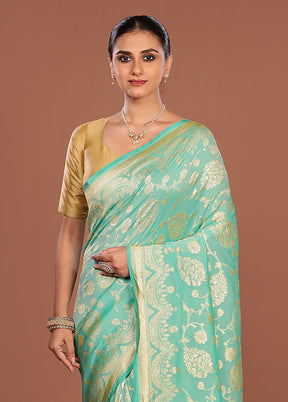Green Handloom Pure Georgette Saree With Blouse Piece