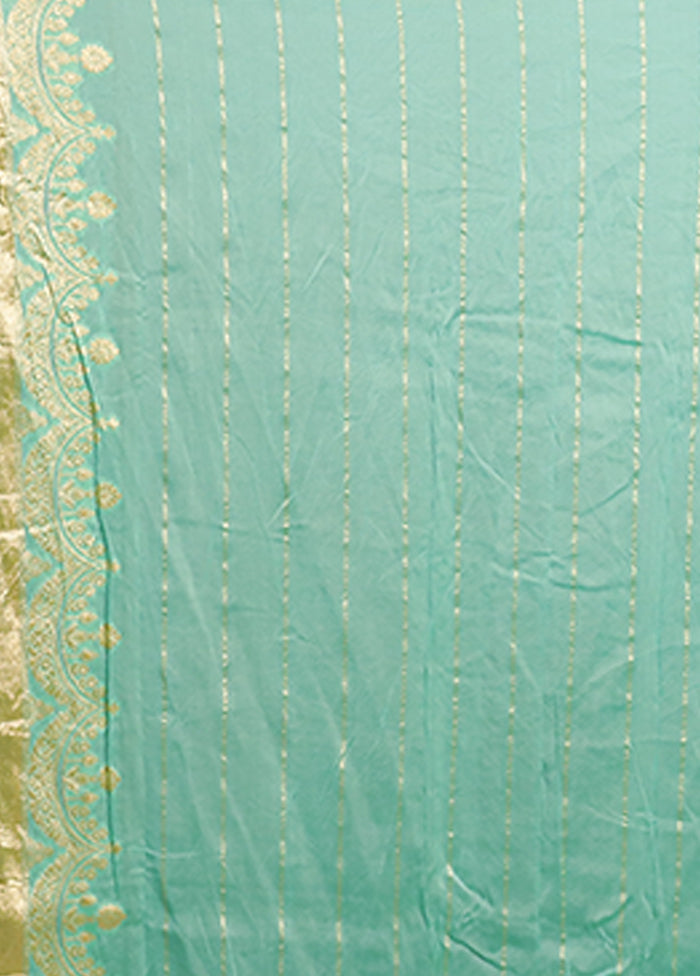 Green Handloom Pure Georgette Saree With Blouse Piece