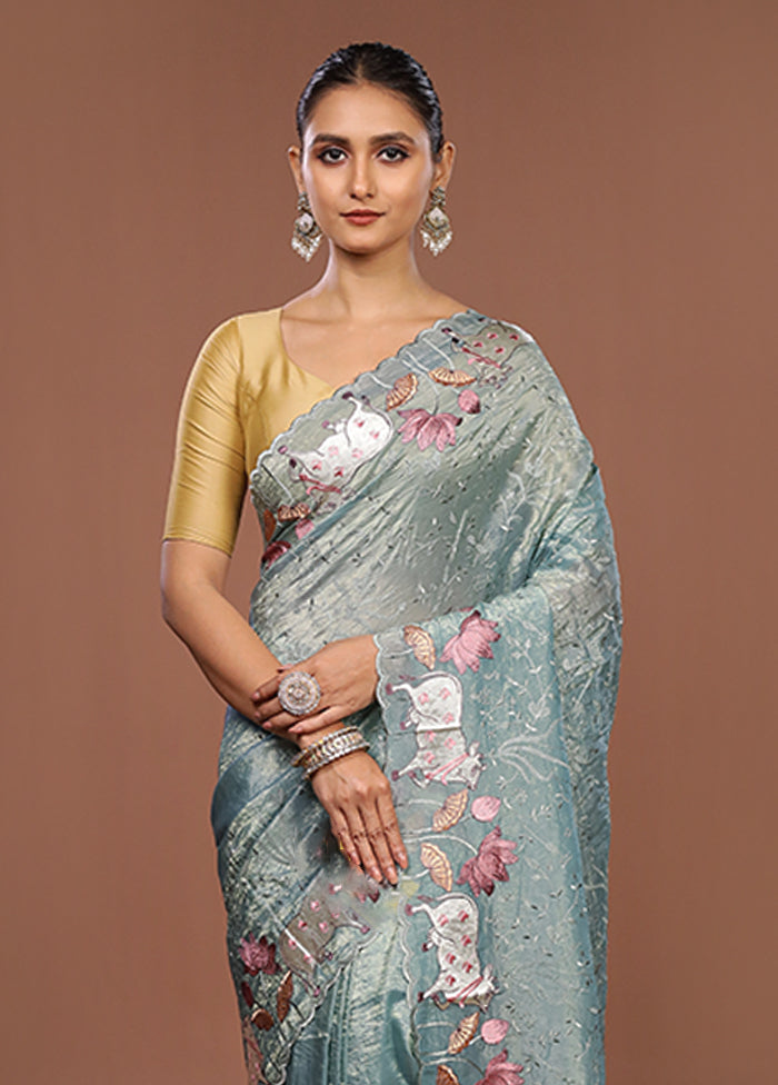 Green Tissue Silk Saree With Blouse Piece