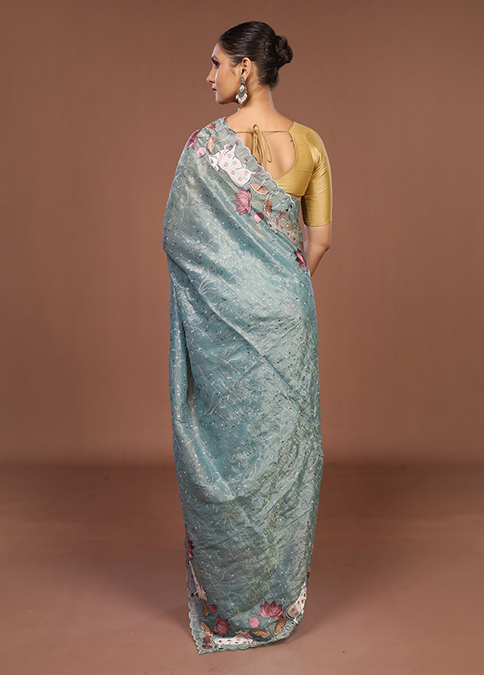 Green Tissue Silk Saree With Blouse Piece