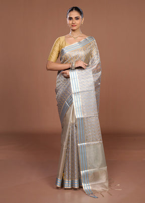 Cream Tissue Silk Saree With Blouse Piece