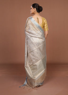 Cream Tissue Silk Saree With Blouse Piece