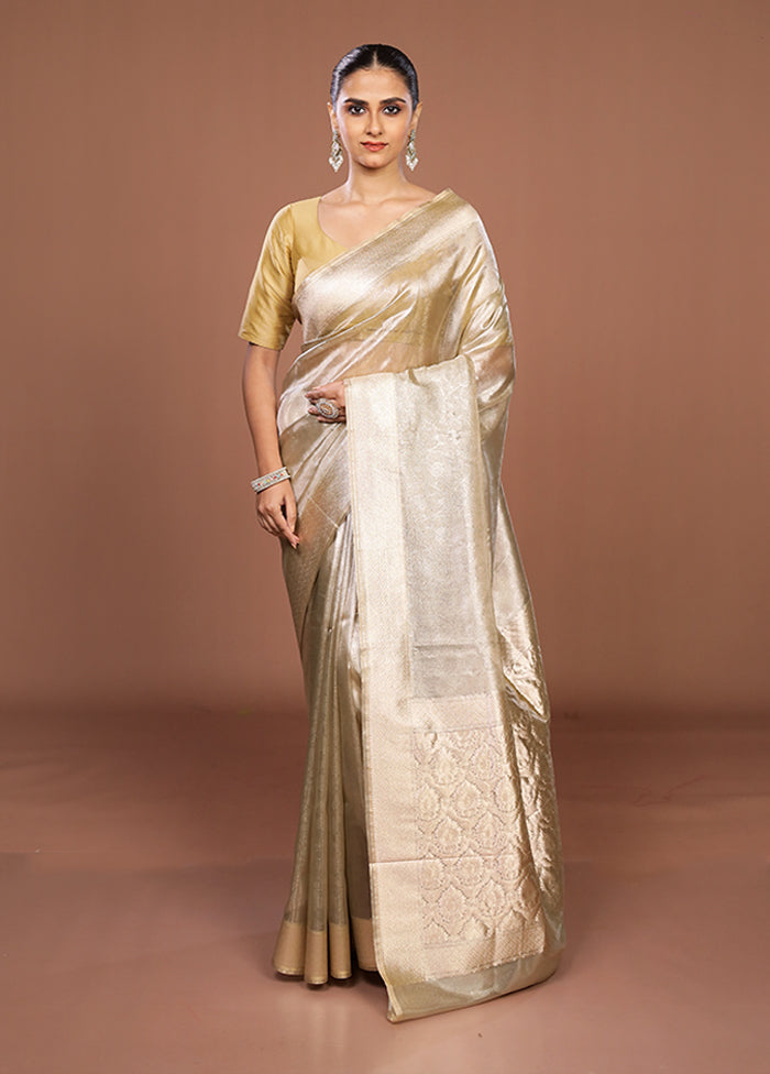 Cream Tissue Silk Saree With Blouse Piece