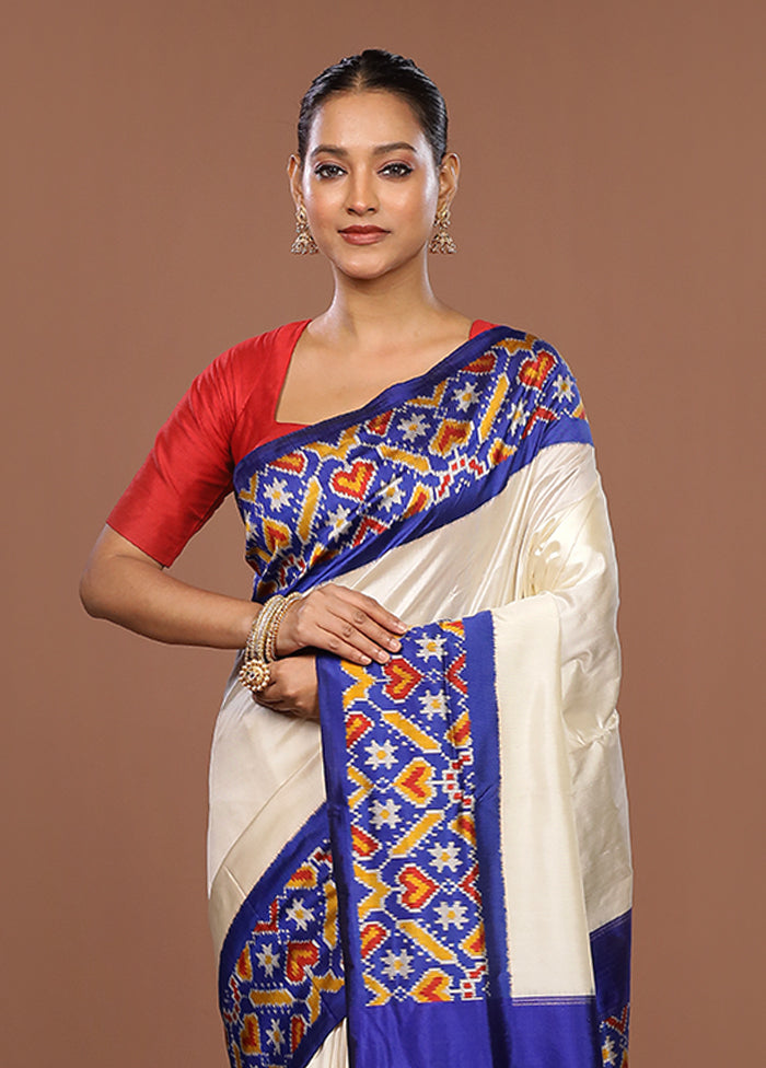 White Handloom Ikkat Pure Silk Saree With Blouse Piece