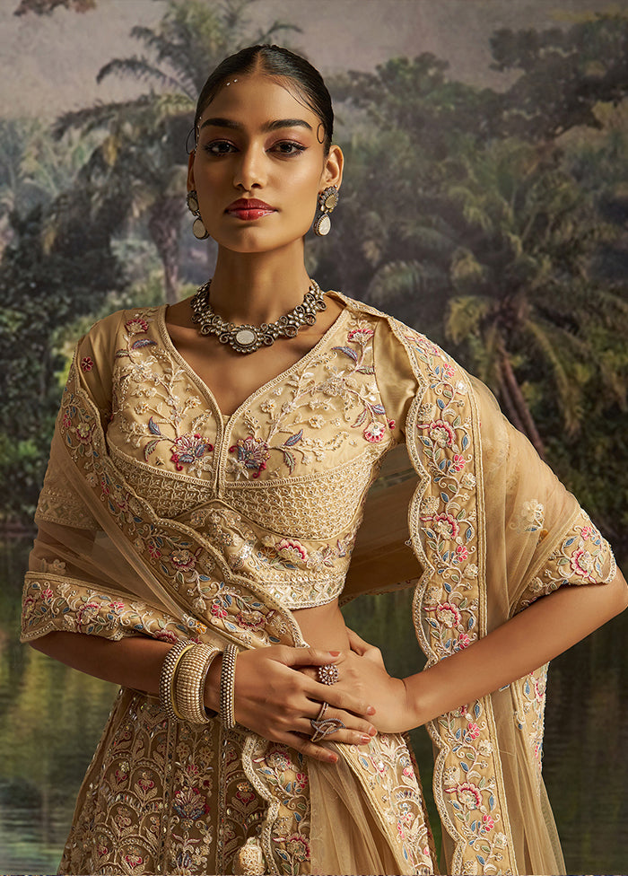 Cream Net Lehenga Set