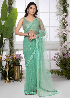 Mint Green Net Butta Saree by LUKSE