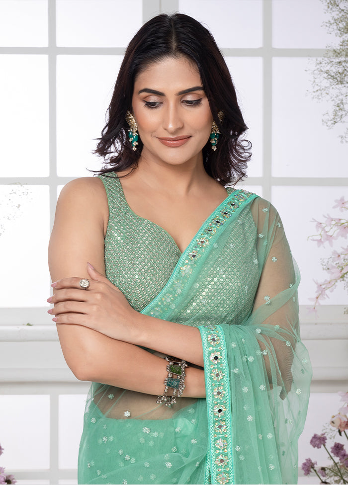 Mint Green Net Butta Saree by LUKSE